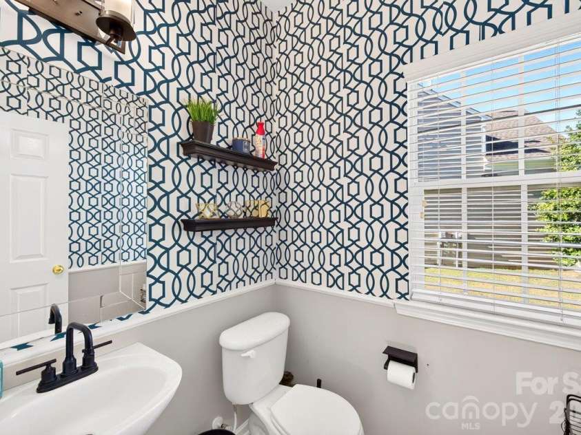 10536 Adlin Avenue, Charlotte, NC 28262.  MLS# CAR4429740, YatesRealty ID 53922. Half bath on main level