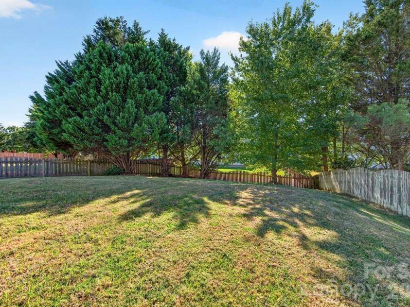 10536 Adlin Avenue, Charlotte, NC 28262.  MLS# CAR4429740, YatesRealty ID 53922. Large fenced backyard