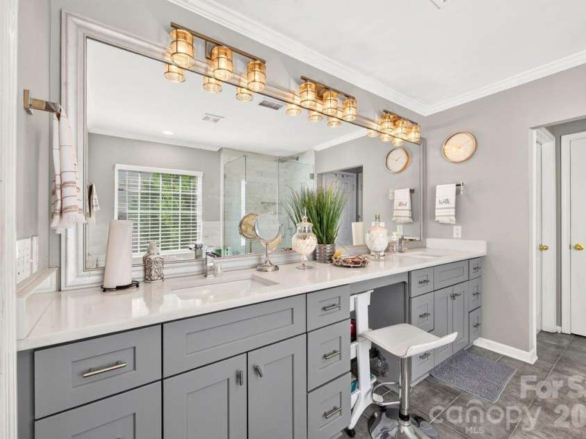 10536 Adlin Avenue, Charlotte, NC 28262.  MLS# CAR4429740, YatesRealty ID 53922. Primary bathroom has 2 sinks and vanity area.