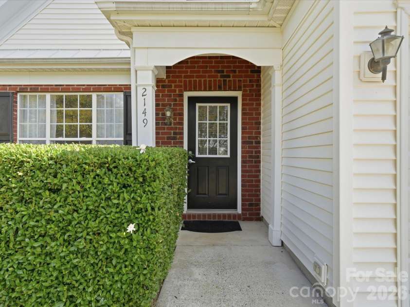2149 Mckenzie Creek Drive, Charlotte, NC 28270.  MLS# CAR4429799, YatesRealty ID 53929. Covered front porch.