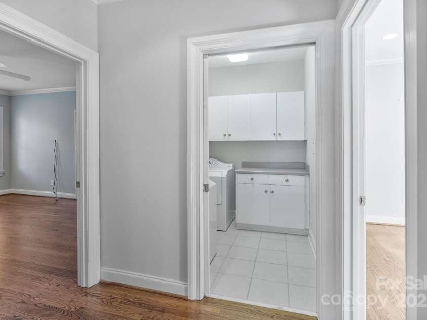 1131 Kings Drive, Charlotte, NC 28207.  MLS# CAR4235522, YatesRealty ID 5393. Laundry upstairs - where the bedrooms are. There's another laundry in the Primary Bedroom closet.