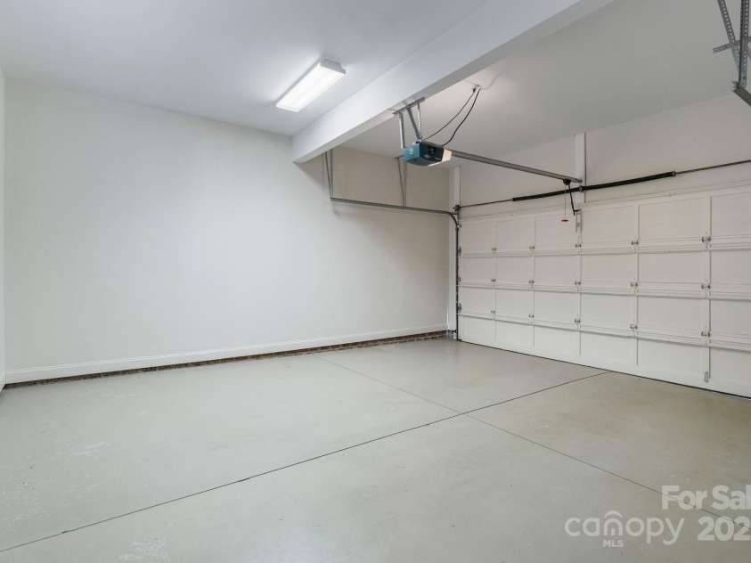 1131 Kings Drive, Charlotte, NC 28207.  MLS# CAR4235522, YatesRealty ID 5393. The 2-car garage is clean as a whistle!