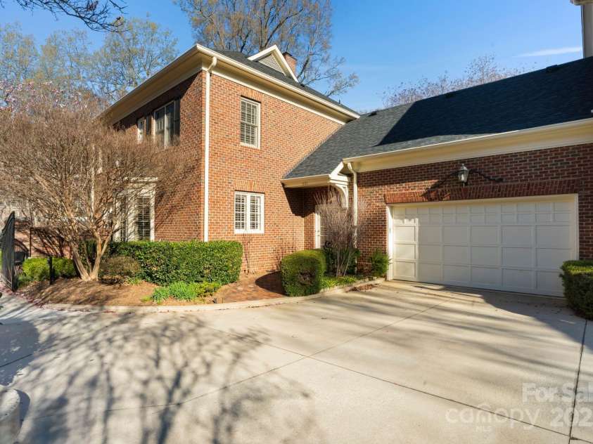 1131 Kings Drive, Charlotte, NC 28207.  MLS# CAR4235522, YatesRealty ID 5393. The garage and turn-around.