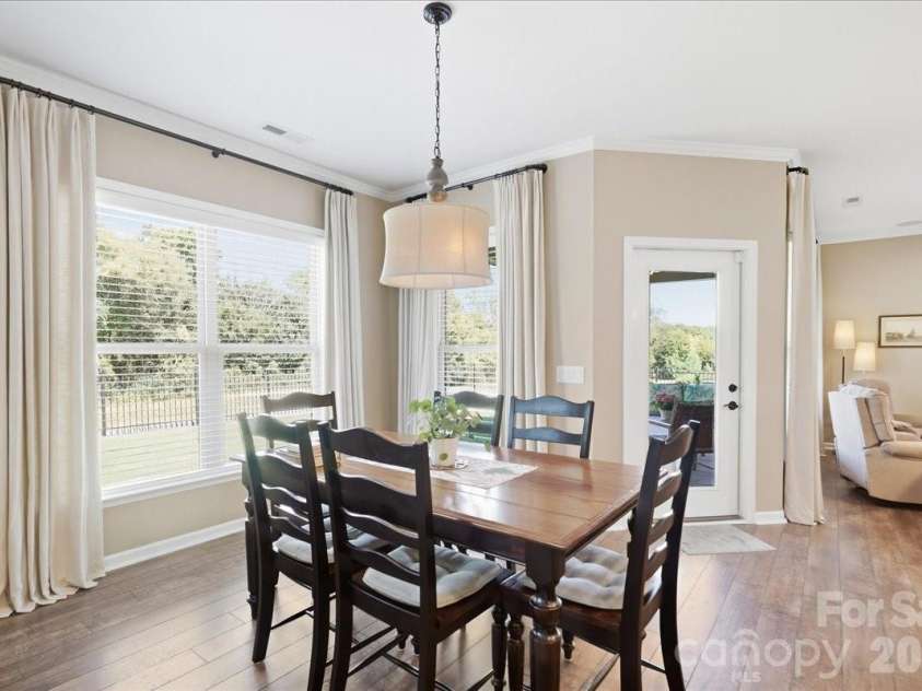 445 Haven Avenue, Fort Mill, SC 29715.  MLS# CAR4428956, YatesRealty ID 53954. Breakfast area overlooks back yard