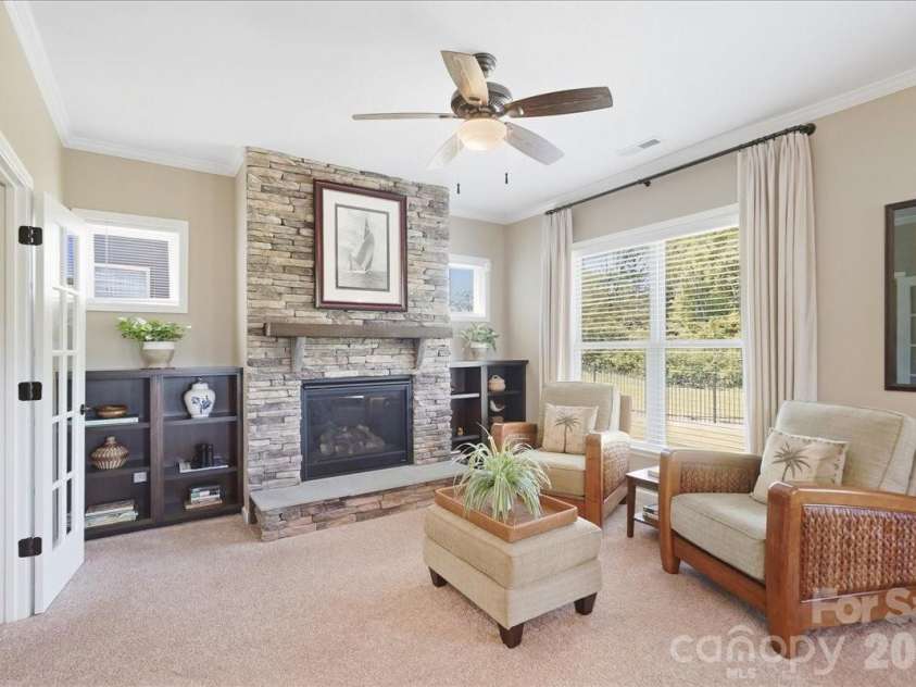 445 Haven Avenue, Fort Mill, SC 29715.  MLS# CAR4428956, YatesRealty ID 53954. Stone fireplace w/heat blower
