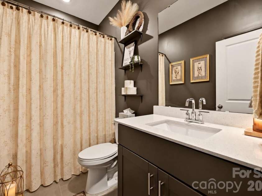7715 Porrera Street, Charlotte, NC 28214.  MLS# CAR4428468, YatesRealty ID 53964. Hall Bath