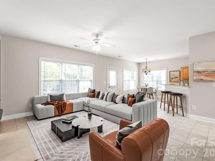 2008 Trace Creek Drive, Waxhaw, NC 28173.  MLS# CAR4428166, YatesRealty ID 53969. The open living space flows effortlessly into the chef's kitchen and sunny breakfast nook, creating a cohesive hub for casual morning coffee and vibrant evening gatherings. Virtually Staged.
