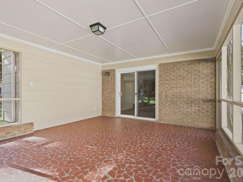 4235 Blalock Avenue, Charlotte, NC 28210.  MLS# CAR4426840, YatesRealty ID 53977. Broken Tile Screen Porch