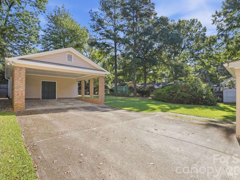 4235 Blalock Avenue, Charlotte, NC 28210.  MLS# CAR4426840, YatesRealty ID 53977. Carport