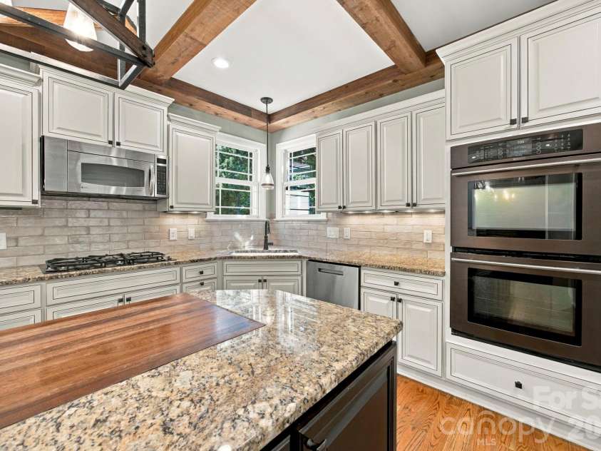 7481 Brotherton Road, Denver, NC 28037.  MLS# CAR4427523, YatesRealty ID 53983. Corner sink and double ovens