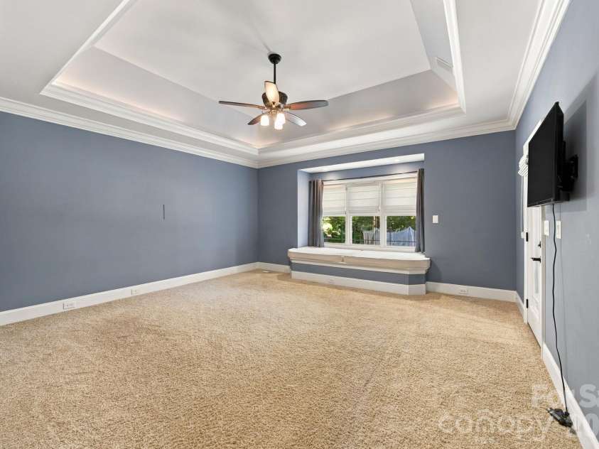 7481 Brotherton Road, Denver, NC 28037.  MLS# CAR4427523, YatesRealty ID 53983. Main Level Primary Suite with window settee