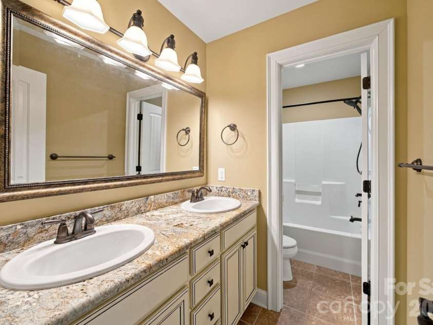 7481 Brotherton Road, Denver, NC 28037.  MLS# CAR4427523, YatesRealty ID 53983. Upper level bathroom