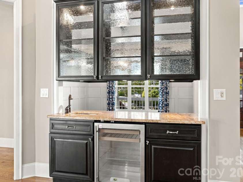 7481 Brotherton Road, Denver, NC 28037.  MLS# CAR4427523, YatesRealty ID 53983. Wet Bar with Beverage Fridge