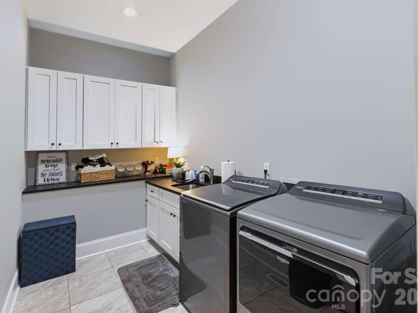 7001 Duncan Road, Indian Trail, NC 28079.  MLS# CAR4427411, YatesRealty ID 53985. Laundry