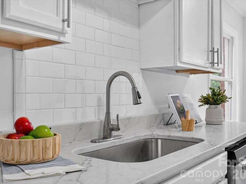 2048 Simmons Street, Gastonia, NC 28052.  MLS# CAR4427061, YatesRealty ID 53987. New quartz counters and stainless sink