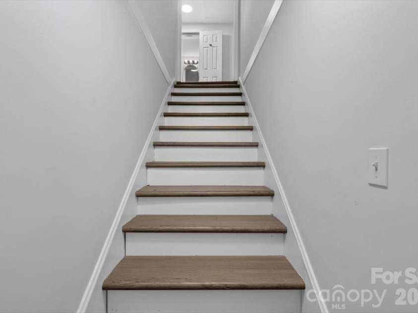 2048 Simmons Street, Gastonia, NC 28052.  MLS# CAR4427061, YatesRealty ID 53987. Stairs to second floor