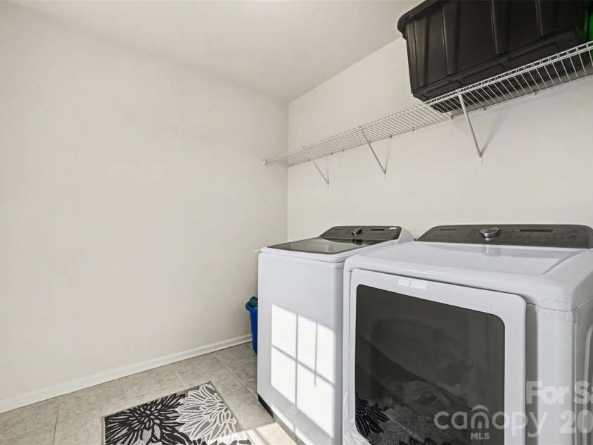 1311 Tollcross Road, Indian Trail, NC 28079.  MLS# CAR4350661, YatesRealty ID 5399. 2nd floor laundry 