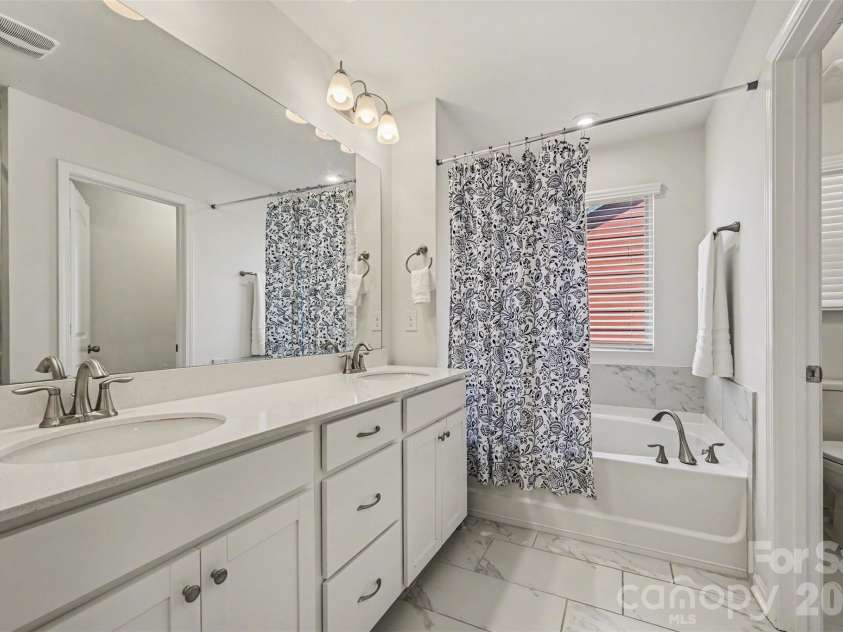 1311 Tollcross Road, Indian Trail, NC 28079.  MLS# CAR4350661, YatesRealty ID 5399. Primary bath