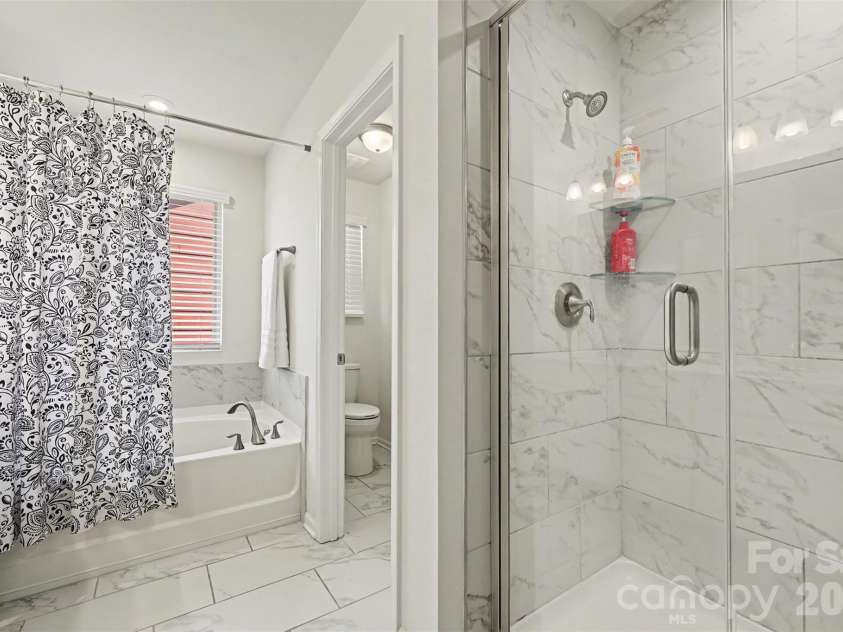 1311 Tollcross Road, Indian Trail, NC 28079.  MLS# CAR4350661, YatesRealty ID 5399. Primary bath