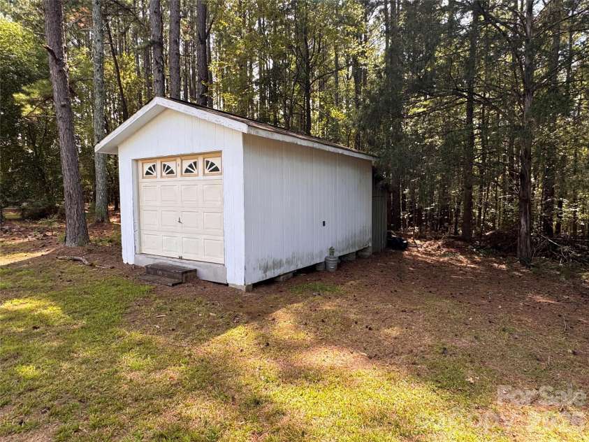 1037 Cross Creek Drive, Oakboro, NC 28129.  MLS# CAR4423754, YatesRealty ID 53990. 