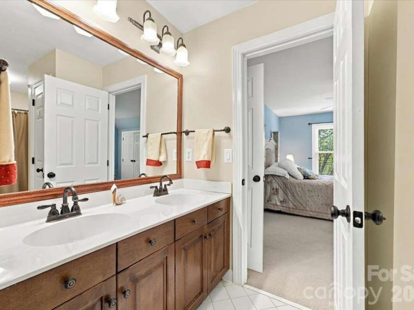 178 Cove Creek Loop, Mooresville, NC 28117.  MLS# CAR4424968, YatesRealty ID 53992. His and hers ensuite bathroom