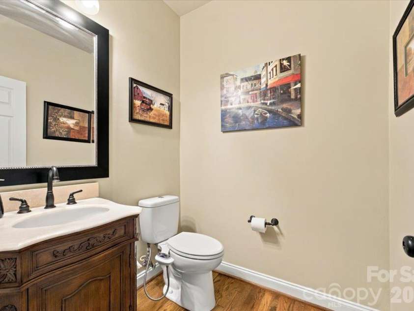 178 Cove Creek Loop, Mooresville, NC 28117.  MLS# CAR4424968, YatesRealty ID 53992. Powder room on main