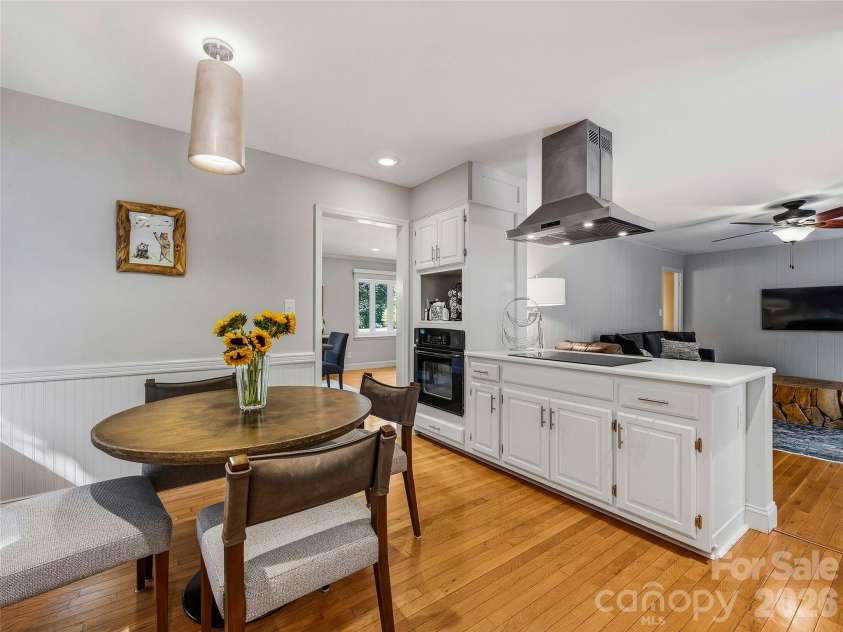 531 Bluebird Ridge, Asheville, NC 28804.  MLS# CAR4424625, YatesRealty ID 53994. Kitchen looking into den.
