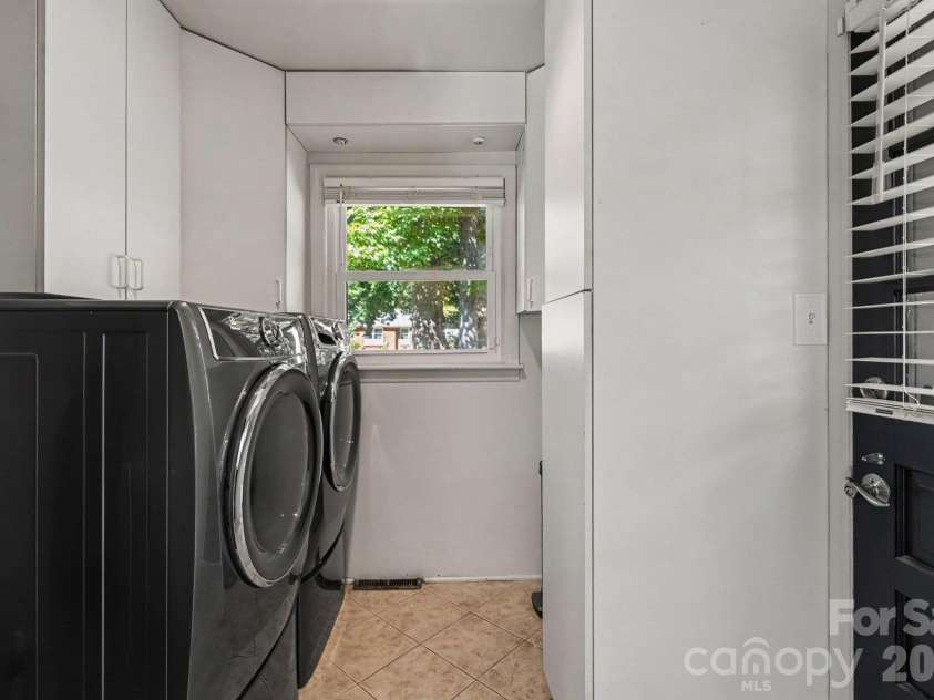 5401 Seacroft Road, Charlotte, NC 28210.  MLS# CAR4421337, YatesRealty ID 54004. Laundry room and extra storage