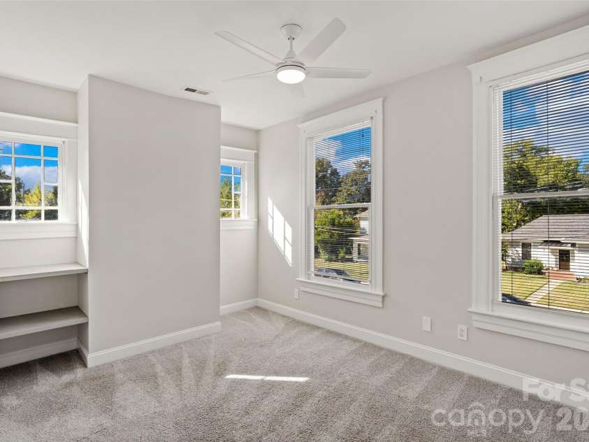 233 Marion Street, Rock Hill, SC 29730.  MLS# CAR4415460, YatesRealty ID 54008. Bright bedroom with built-in shelving