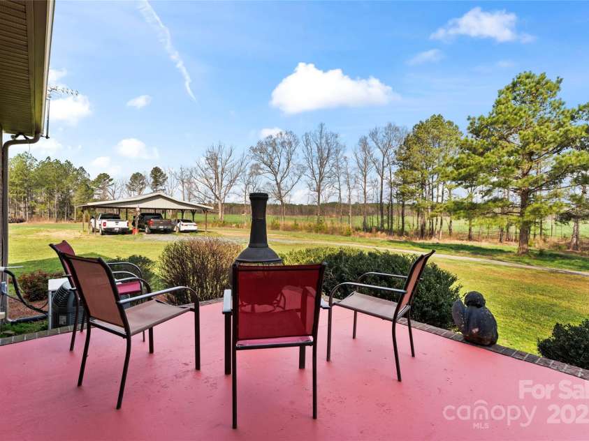 158 White Road, Wadesboro, NC 28170.  MLS# CAR4207343, YatesRealty ID 5401. Back porch off of dining room.