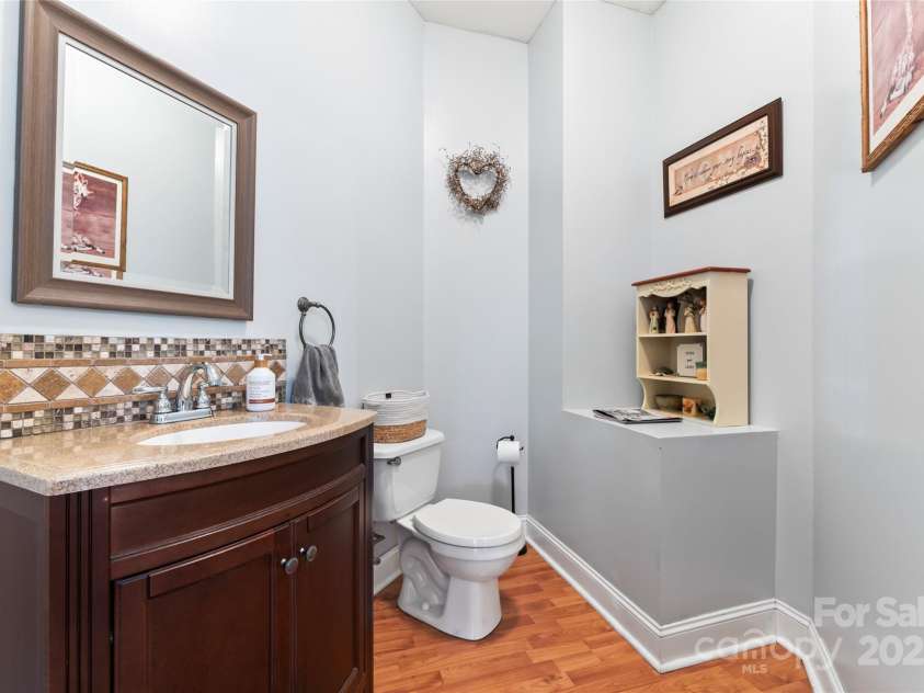 158 White Road, Wadesboro, NC 28170.  MLS# CAR4207343, YatesRealty ID 5401. Half bathroom off of living area.