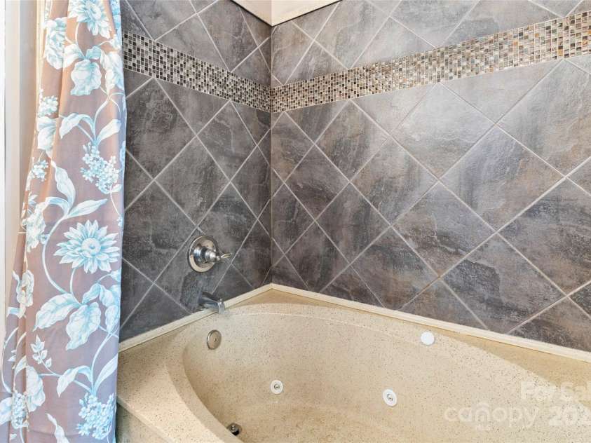 158 White Road, Wadesboro, NC 28170.  MLS# CAR4207343, YatesRealty ID 5401. Jet tub in primary bedroom.