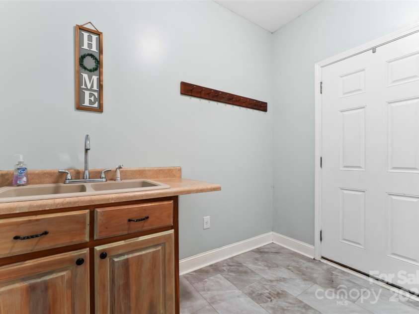 158 White Road, Wadesboro, NC 28170.  MLS# CAR4207343, YatesRealty ID 5401. Mudroom with sink.