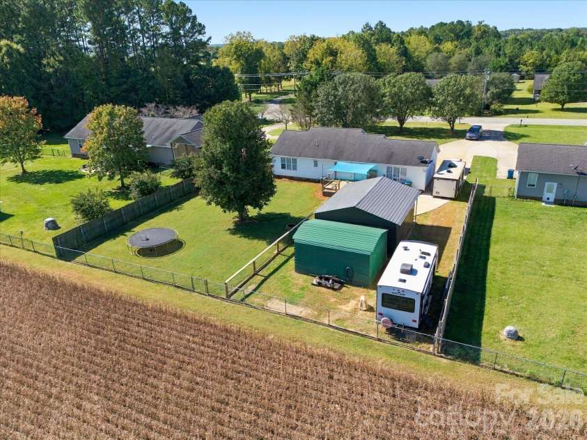 7580 Woodleaf Road, Woodleaf, NC 27054.  MLS# CAR4427833, YatesRealty ID 54012. Aerial view from back of property