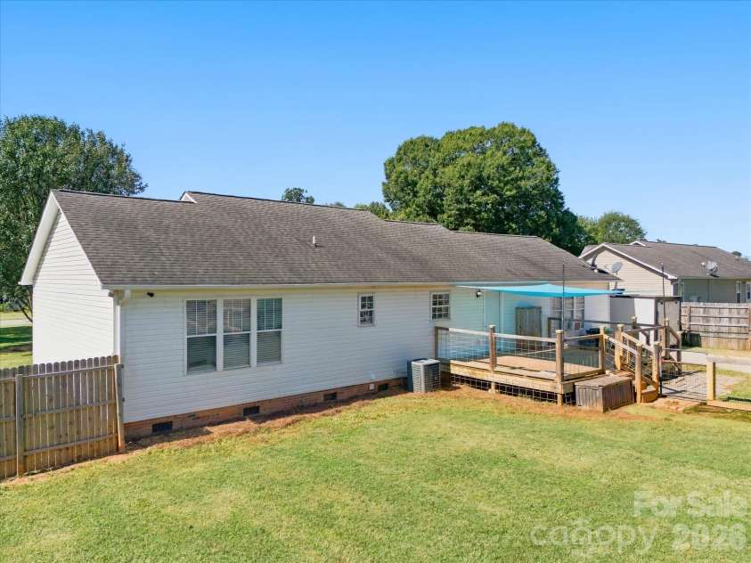 7580 Woodleaf Road, Woodleaf, NC 27054.  MLS# CAR4427833, YatesRealty ID 54012. Back of home
