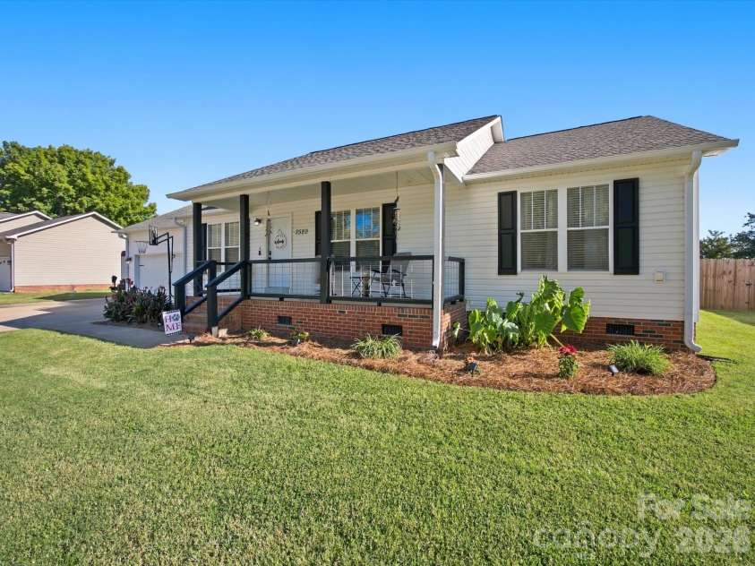 7580 Woodleaf Road, Woodleaf, NC 27054.  MLS# CAR4427833, YatesRealty ID 54012. Beautiful curb appeal