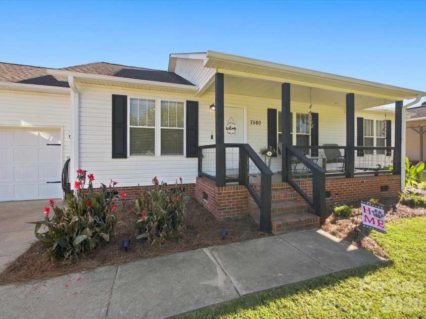 7580 Woodleaf Road, Woodleaf, NC 27054.  MLS# CAR4427833, YatesRealty ID 54012. Covered front porch