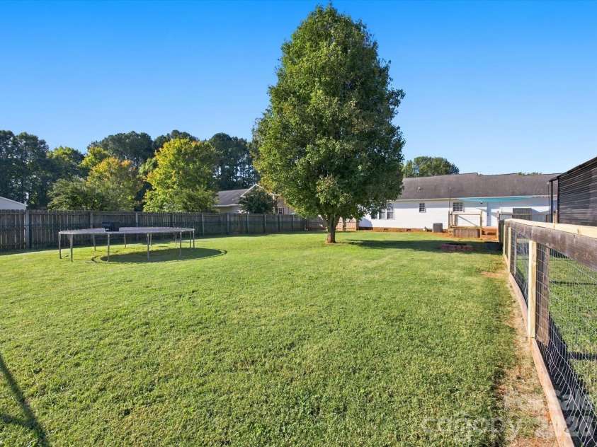7580 Woodleaf Road, Woodleaf, NC 27054.  MLS# CAR4427833, YatesRealty ID 54012. Large fenced back yard