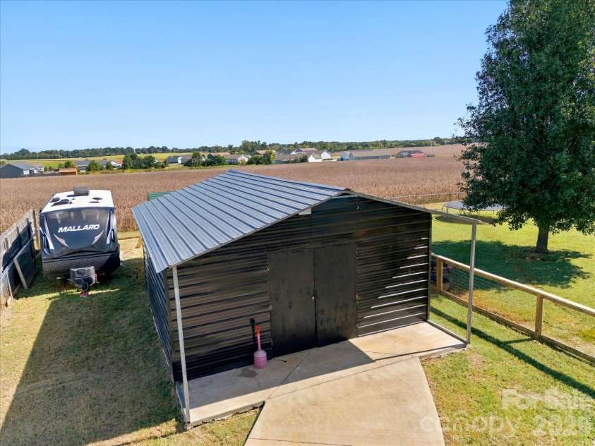 7580 Woodleaf Road, Woodleaf, NC 27054.  MLS# CAR4427833, YatesRealty ID 54012. Plenty of yard for storage