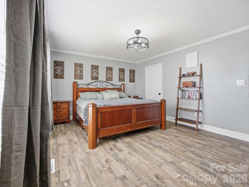7580 Woodleaf Road, Woodleaf, NC 27054.  MLS# CAR4427833, YatesRealty ID 54012. Primary bedroom
