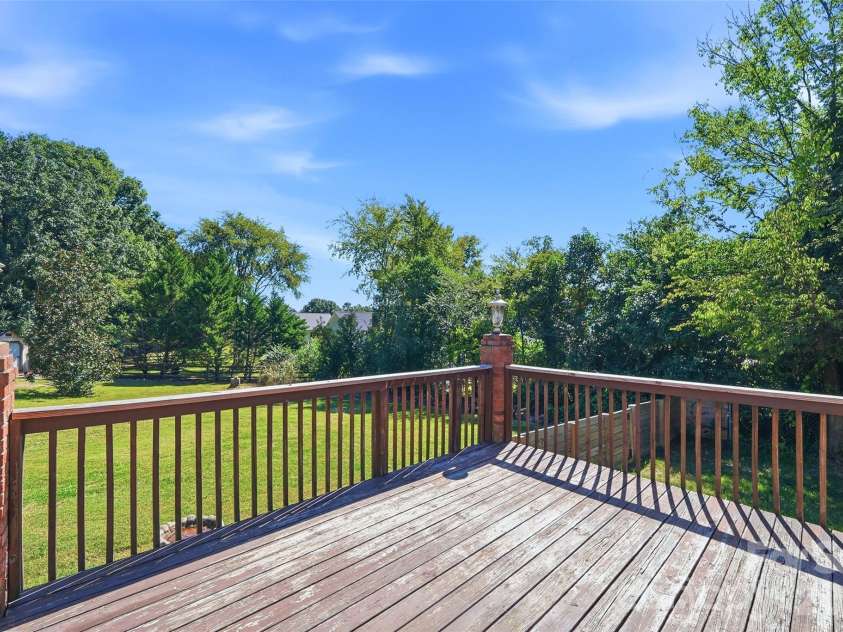 2351 Ellerbe Drive, Kannapolis, NC 28083.  MLS# CAR4430208, YatesRealty ID 54016. Deck overlooking the yard