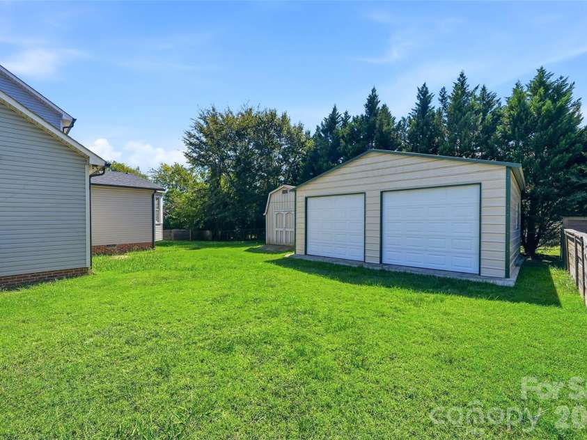 2351 Ellerbe Drive, Kannapolis, NC 28083.  MLS# CAR4430208, YatesRealty ID 54016. Detached 2-car garage