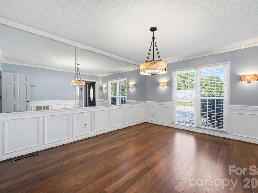 2351 Ellerbe Drive, Kannapolis, NC 28083.  MLS# CAR4430208, YatesRealty ID 54016. Formal dining room with wainscoting