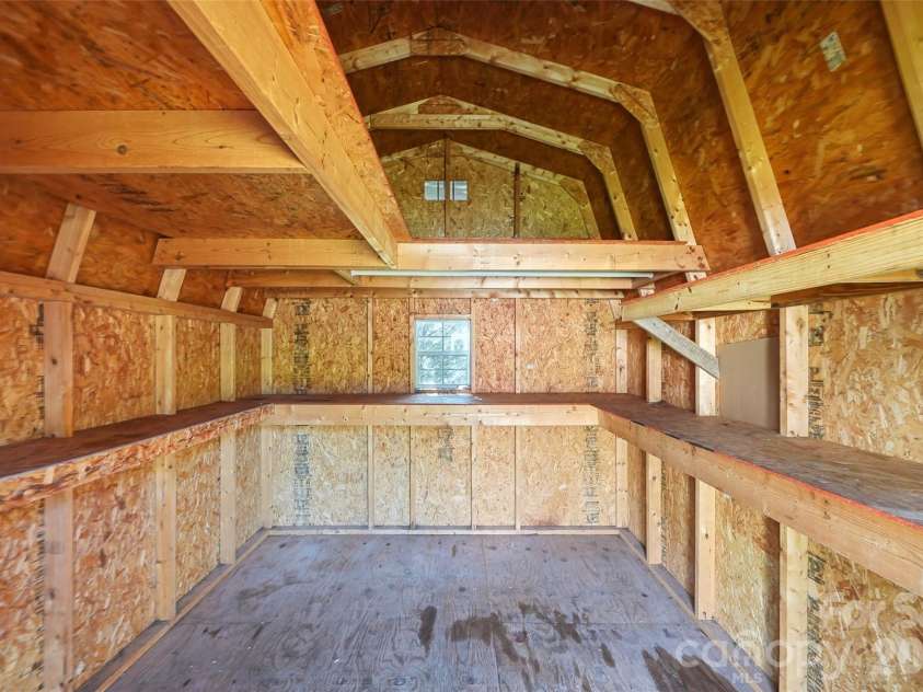 2351 Ellerbe Drive, Kannapolis, NC 28083.  MLS# CAR4430208, YatesRealty ID 54016. Two-story storage shed interior