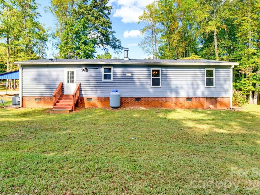 5119 Pine Springs Drive, Bessemer City, NC 28016.  MLS# CAR4430014, YatesRealty ID 54018. 