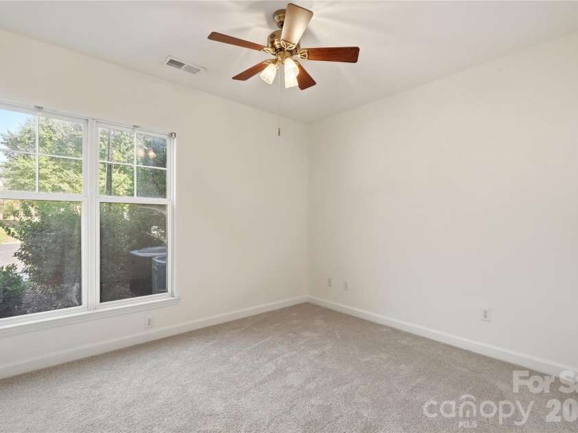 16406 Redstone Mountain Lane, Charlotte, NC 28277.  MLS# CAR4429830, YatesRealty ID 54019. Front bedroom, new carpet