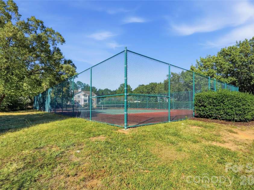 16406 Redstone Mountain Lane, Charlotte, NC 28277.  MLS# CAR4429830, YatesRealty ID 54019. Tennis courts