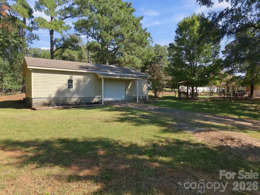 82 Henderson Street, Badin, NC 28009.  MLS# CAR4430106, YatesRealty ID 54020. 