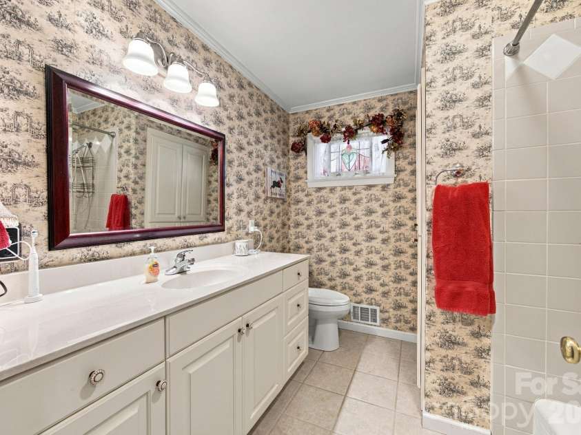 82 Henderson Street, Badin, NC 28009.  MLS# CAR4430106, YatesRealty ID 54020. 