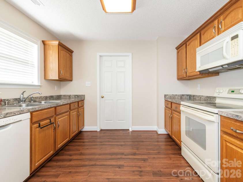 8415 Quail Hollow Drive, Harrisburg, NC 28075.  MLS# CAR4424111, YatesRealty ID 54022. 